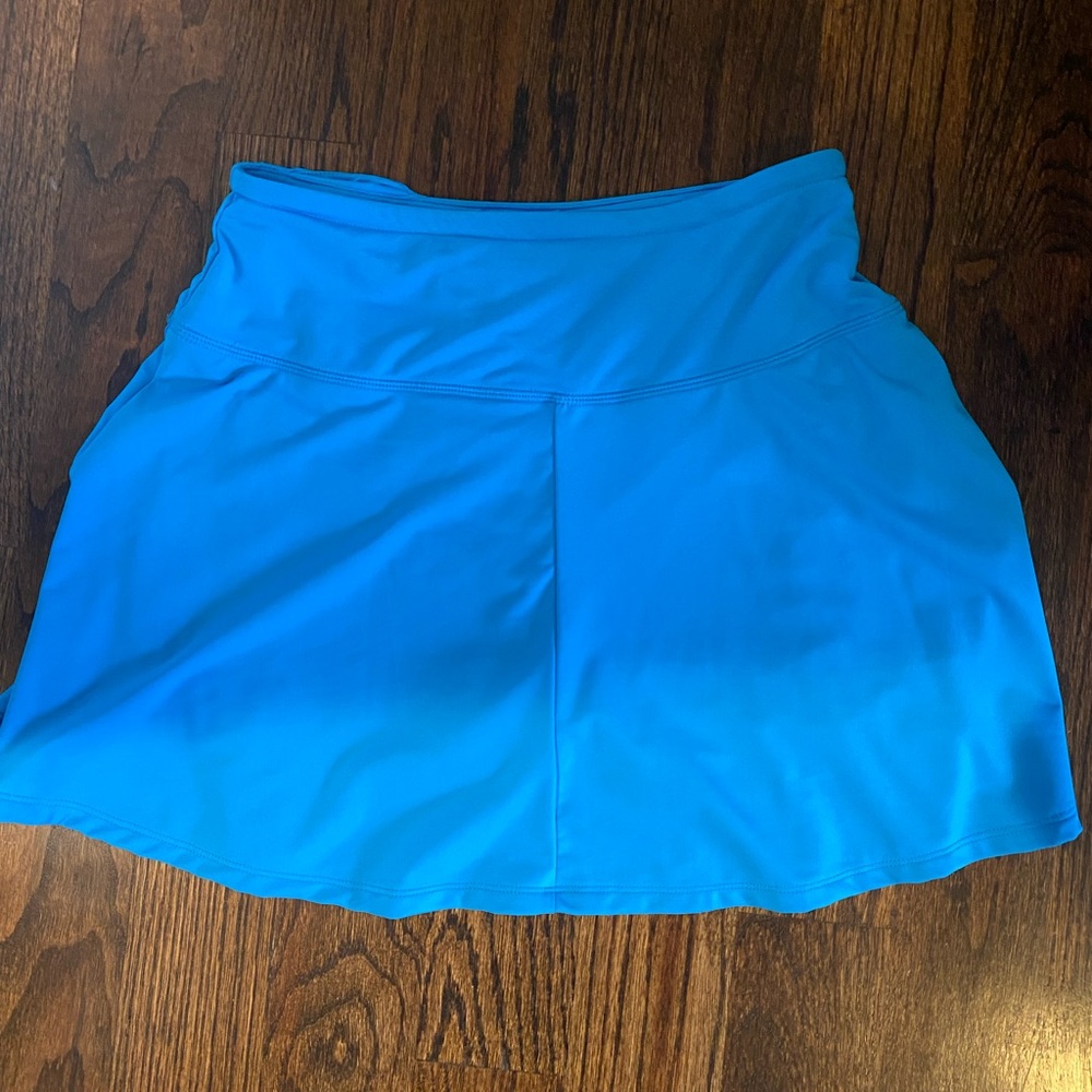 Bright blue tennis skirt with built in shorts